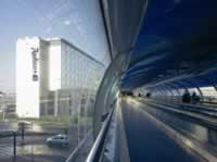 Radisson Manchester Airport & Skylink Walkway or right