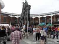 Crowds around the Corn Barge Statue